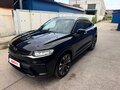 2022 Geely Tugella I Рестайлинг, чёрный - вид 2