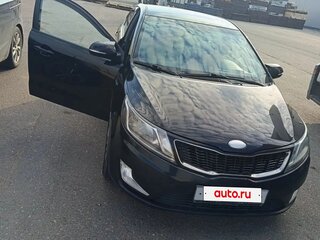 2014 Kia Rio 4-speed III, чёрный, 890000 рублей, вид 5