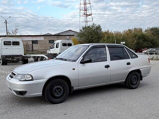 2010 Daewoo Nexia I Рестайлинг, серебристый, 280000 рублей, вид 3
