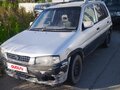 1997 Mazda Demio I (DW), серый, 62000 рублей