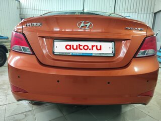 2015 Hyundai Solaris I Рестайлинг, оранжевый, 785000 рублей, вид 4