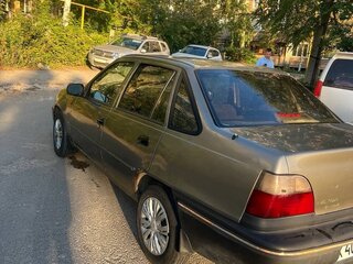 2001 Daewoo Nexia I, коричневый, 65000 рублей, вид 5