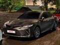 2021 Toyota Camry VIII (XV70), коричневый, 2650000 рублей