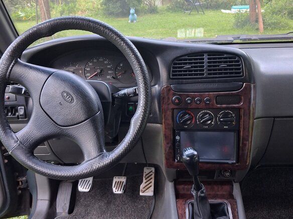 1998 Kia Sportage I, зелёный - вид 13