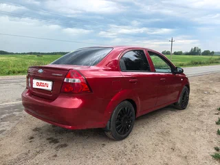 2011 Chevrolet Aveo I Рестайлинг, красный, 350000 рублей, вид 2
