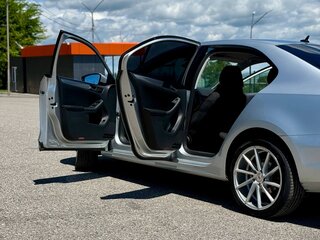 2015 Volkswagen Jetta VI Рестайлинг, серебристый, 1050000 рублей, вид 5