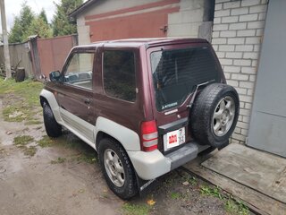 1995 Mitsubishi Pajero Junior, красный, 325000 рублей, вид 2