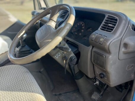 1994 Isuzu Elf (N-series), синий, 650000 рублей, вид 4