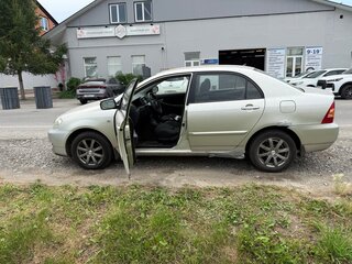 2005 Toyota Corolla IX (E120, E130) Рестайлинг, серебристый, 400000 рублей, вид 4