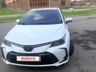 2021 Toyota Corolla XII (E210), белый, 1855000 рублей, вид 1