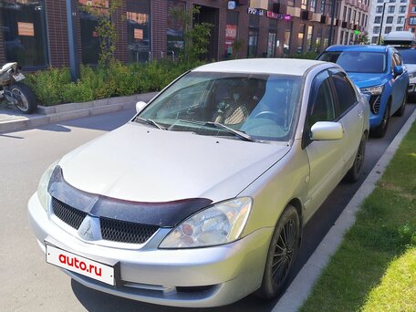 2006 Mitsubishi Lancer IX Рестайлинг, серебристый, 270000 рублей, вид 1