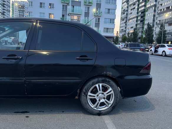 2006 Mitsubishi Lancer IX Рестайлинг, чёрный, 300000 рублей - вид 9