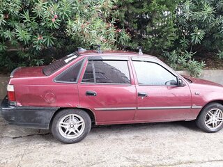 2006 Daewoo Nexia I, пурпурный, 180000 рублей, вид 2