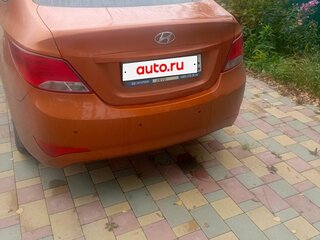 2015 Hyundai Solaris I Рестайлинг, оранжевый, 650000 рублей, вид 2