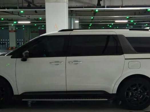 2026 Kia Carnival IV Рестайлинг, белый - вид 3