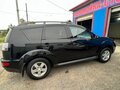 2011 Mitsubishi Outlander II Рестайлинг, чёрный, 1100000 рублей - вид 3