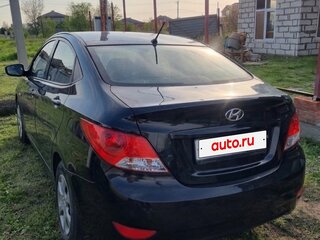 2013 Hyundai Solaris I, чёрный, 700000 рублей, вид 3