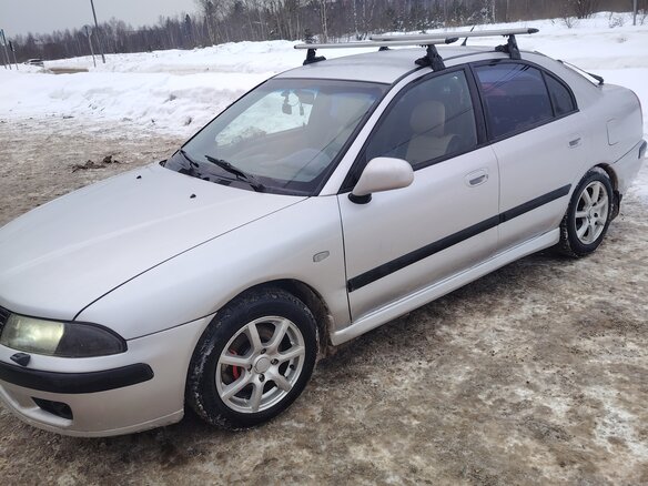 2002 Mitsubishi Carisma I Рестайлинг, серебристый, 240000 рублей