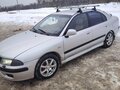 2002 Mitsubishi Carisma I Рестайлинг, серебристый, 240000 рублей