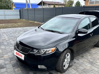 2010 Kia Cerato 6-speed II, чёрный, 650000 рублей, вид 1