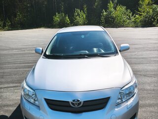 2008 Toyota Corolla X (E140, E150), серебристый, 700000 рублей, вид 2