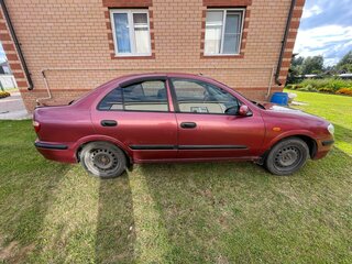 2002 Nissan Almera II (N16), пурпурный, 165000 рублей, вид 3
