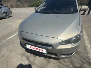 2010 Mitsubishi Lancer X, бежевый, 630000 рублей, вид 1