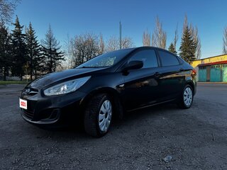 2012 Hyundai Solaris I, чёрный, 655000 рублей, вид 1