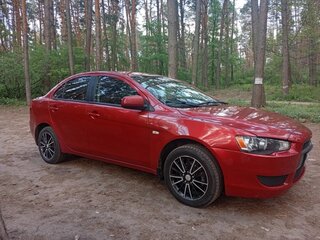 2009 Mitsubishi Lancer X, красный, 650000 рублей, вид 1