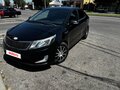 2013 Kia Rio 5-speed III, чёрный, 700000 рублей