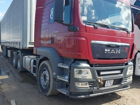 2011 MAN TGS, пурпурный, 3150000 рублей, вид 2