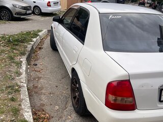 2003 Mazda Familia VIII (BJ), белый, 350000 рублей, вид 3