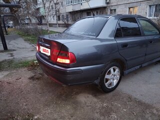 2003 Mitsubishi Carisma I Рестайлинг, серебристый, 260000 рублей, вид 3