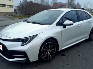 2021 Toyota Corolla XII (E210), белый, 1850000 рублей, вид 2