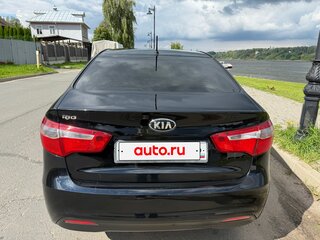 2014 Kia Rio 6-speed III, чёрный, 950000 рублей, вид 5