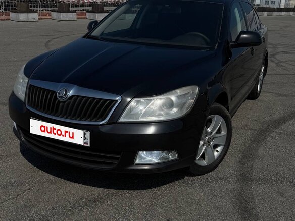 2011 Skoda Octavia II (A5) Рестайлинг, чёрный, 650000 рублей