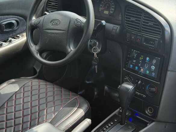 2007 Kia Spectra I Рестайлинг 2, серебристый - вид 4