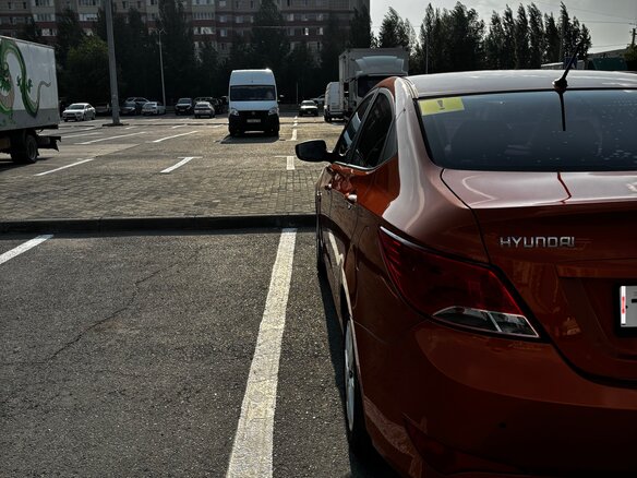 2014 Hyundai Solaris I Рестайлинг, оранжевый, 950000 рублей - вид 17