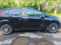 2016 Ford Fiesta Mk6 Рестайлинг, чёрный, 619000 рублей - вид 6