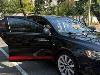 2010 Mitsubishi Lancer X, чёрный, 645000 рублей, вид 5