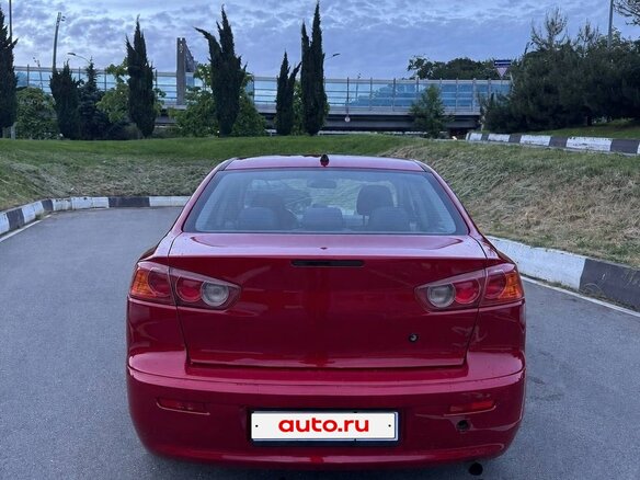 2007 Mitsubishi Lancer X, красный, 635000 рублей - вид 7