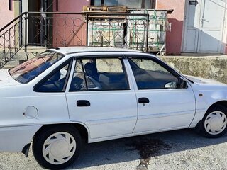 2012 Daewoo Nexia I Рестайлинг, белый, 250000 рублей, вид 3