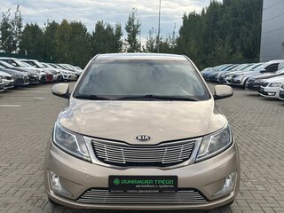 2014 Kia Rio 6-speed III, бежевый, 900000 рублей, вид 3
