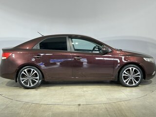 2010 Kia Cerato 5-speed II, красный, 620000 рублей, вид 5