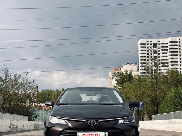 2019 Toyota Corolla XII (E210), коричневый, 1900000 рублей - вид 2