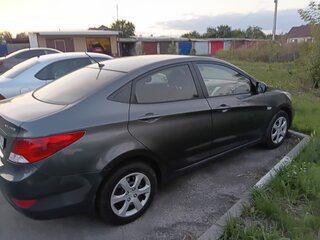 2013 Hyundai Solaris I, чёрный, 730000 рублей, вид 4