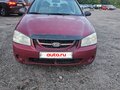 2006 Kia Cerato I, пурпурный, 199999 рублей - вид 1