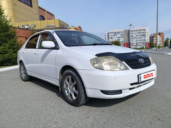 2004 Toyota Corolla IX (E120, E130), белый, 500000 рублей - вид 1
