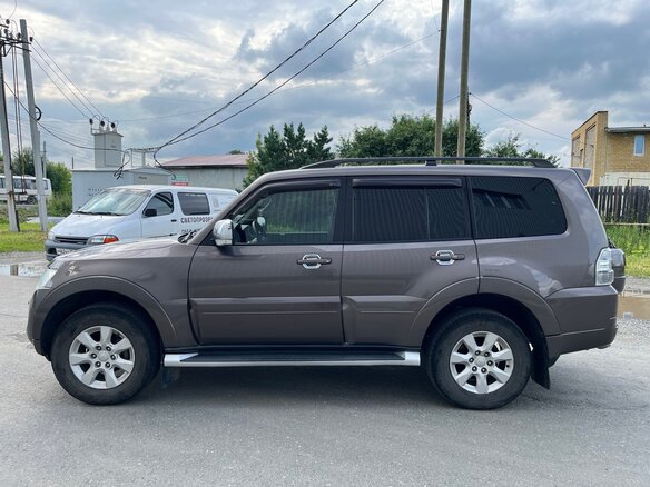 2011 Mitsubishi Pajero IV Рестайлинг 1, коричневый, 2000000 рублей - вид 11