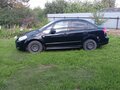 2011 Suzuki SX4 I (Classic) Рестайлинг, чёрный, 600000 рублей - вид 2